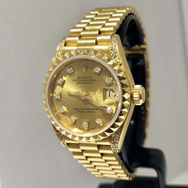 Rolex Oyster Perpetual Datejust. 18 ct. Dama Fixing Time